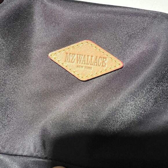 MZ Wallace Marlena backpack in black nylon and leather with red accents. main image 7